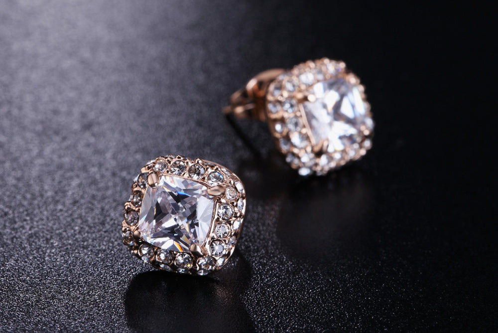 Zirconia Stud Earrings – Platinum or Rose Gold, worn view
